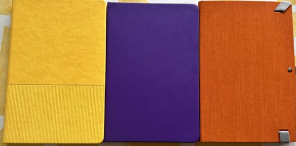 Yellow. Purple, Orange note books