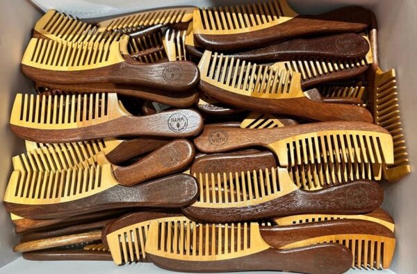 A box of bamboo wide tooth combs