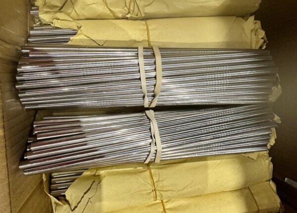 A Box Containing Bundles Of Metal Straws